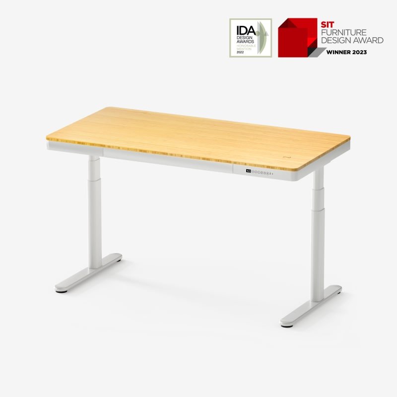 Comhar Pro Q8 with bamboo desktop, white frame and integrated drawer, from the manufacturer listing.